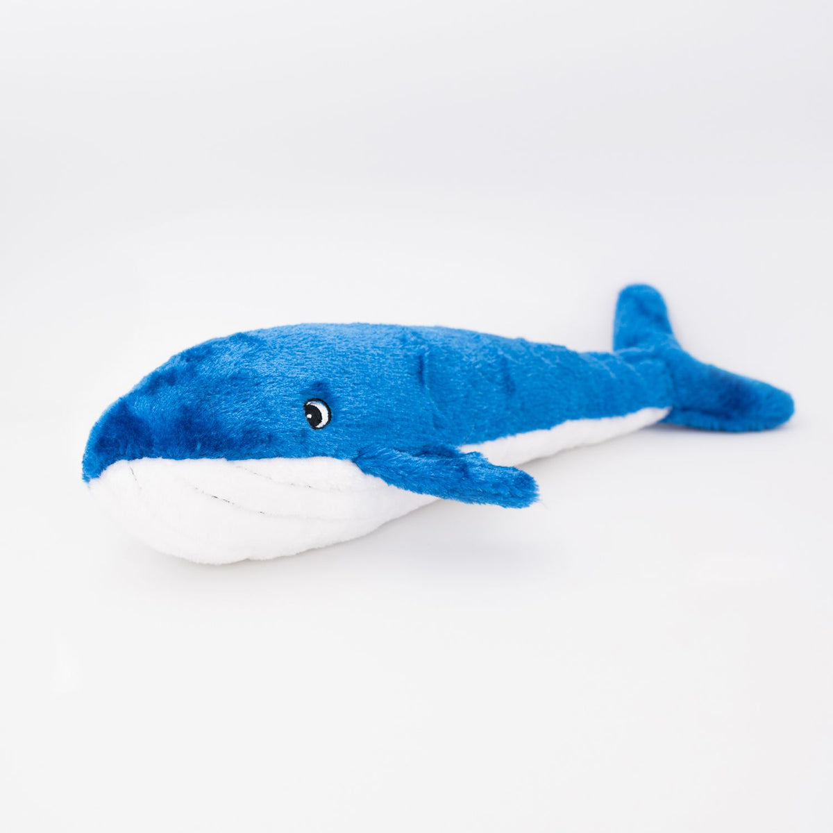 Zippy Paws Jigglerz Blue Whale dog toy, side view of the plush whale