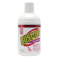 White bottle of Bust-It stain and odour remover with a red dog logo