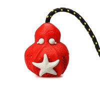 Petopia Ultra Tough Dog Toy Reef Octopus, an octopus shaped treat-dispensing chew toy in 100% natural rubber