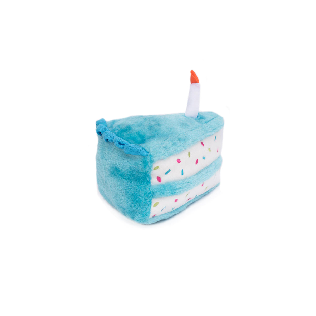 Blue Zippy Paws Birthday Cake dog toy shown from the side showing the frosting and candle