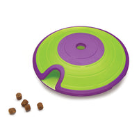 Nina Ottosson Dog Treat Maze Level 2 puzzle, green disc with a purple spiral maze and treats