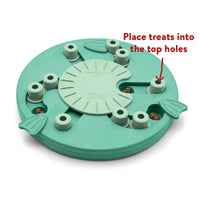 Nina Ottosson Dog Worker composite puzzle in green, annotated to show treats going into the top holes