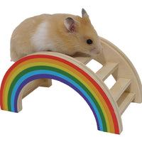A hamster climbing over the Rosewood rainbow painted wooden play bridge