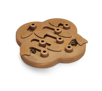 Nina Ottosson Dog Hide N Slide composite puzzle, wood-look board with sliding pegs and treat holes