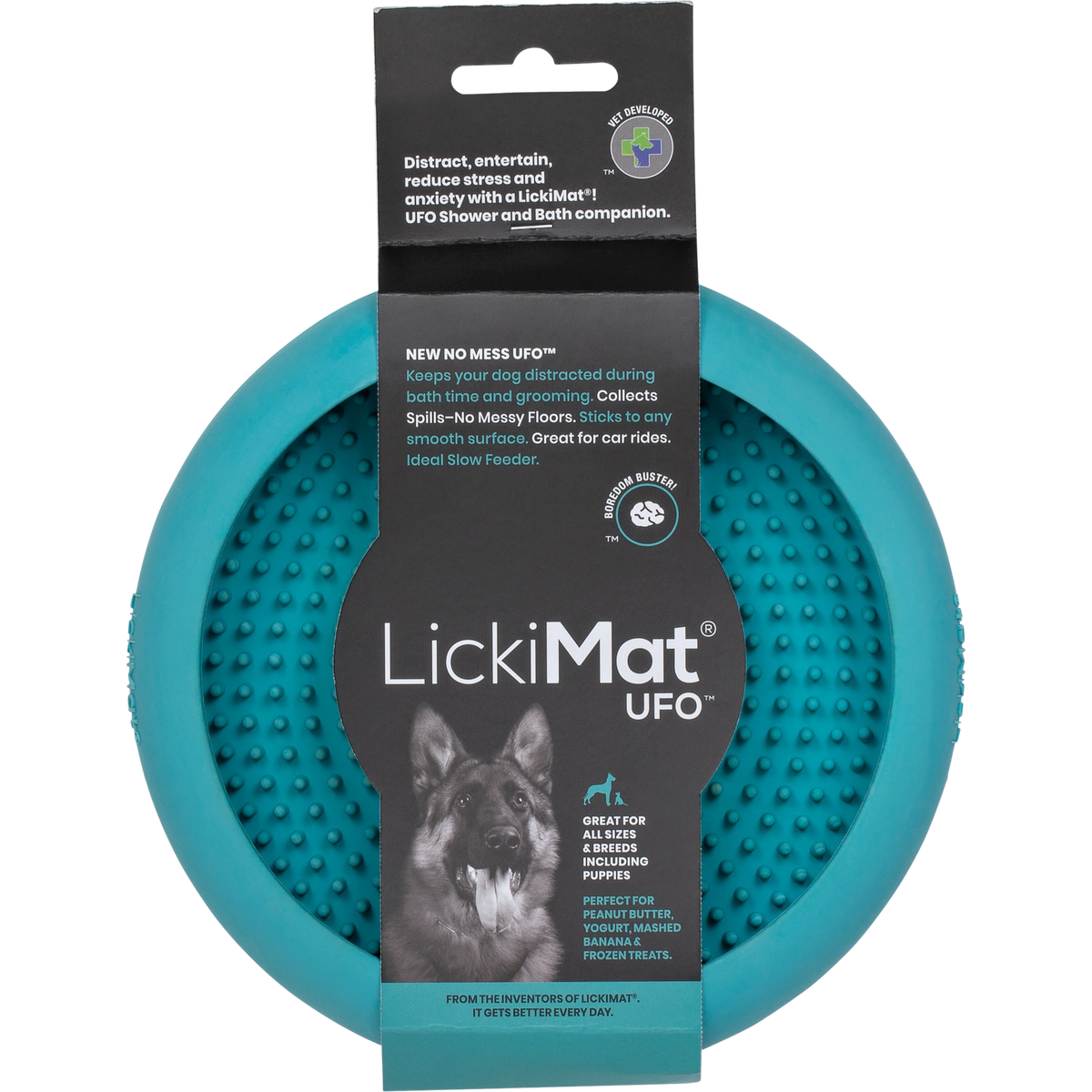 Turquoise LickiMat UFO suction lick bowl in its card with a dog photo