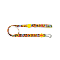 Dashi Boom dog lead in comic-strip print with speech bubbles, yellow bolt tag and silver clip, on white