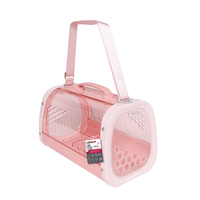 M-Pets HONEY pet carrier in pink, clear hard-shell body with vent holes, shoulder strap and retail tag
