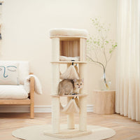 Petsbelle Halfair solid wood cat tree, a tall multi-level tower with a top condo and a cat resting on it