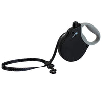 Alcott Adventure retractable dog leash with a black casing and grey grip handle