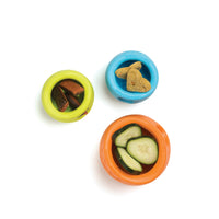 West Paw Toppl treat dispensing dog toy filled with an assortment of treats