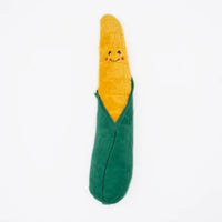 Zippy Paws Jigglerz plush corn cob dog toy with a smiling face and green husk, on white