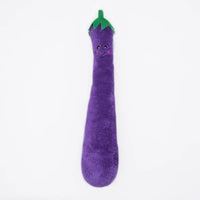 Zippy Paws Jigglerz plush eggplant dog toy with a smiling face and green stem, on white