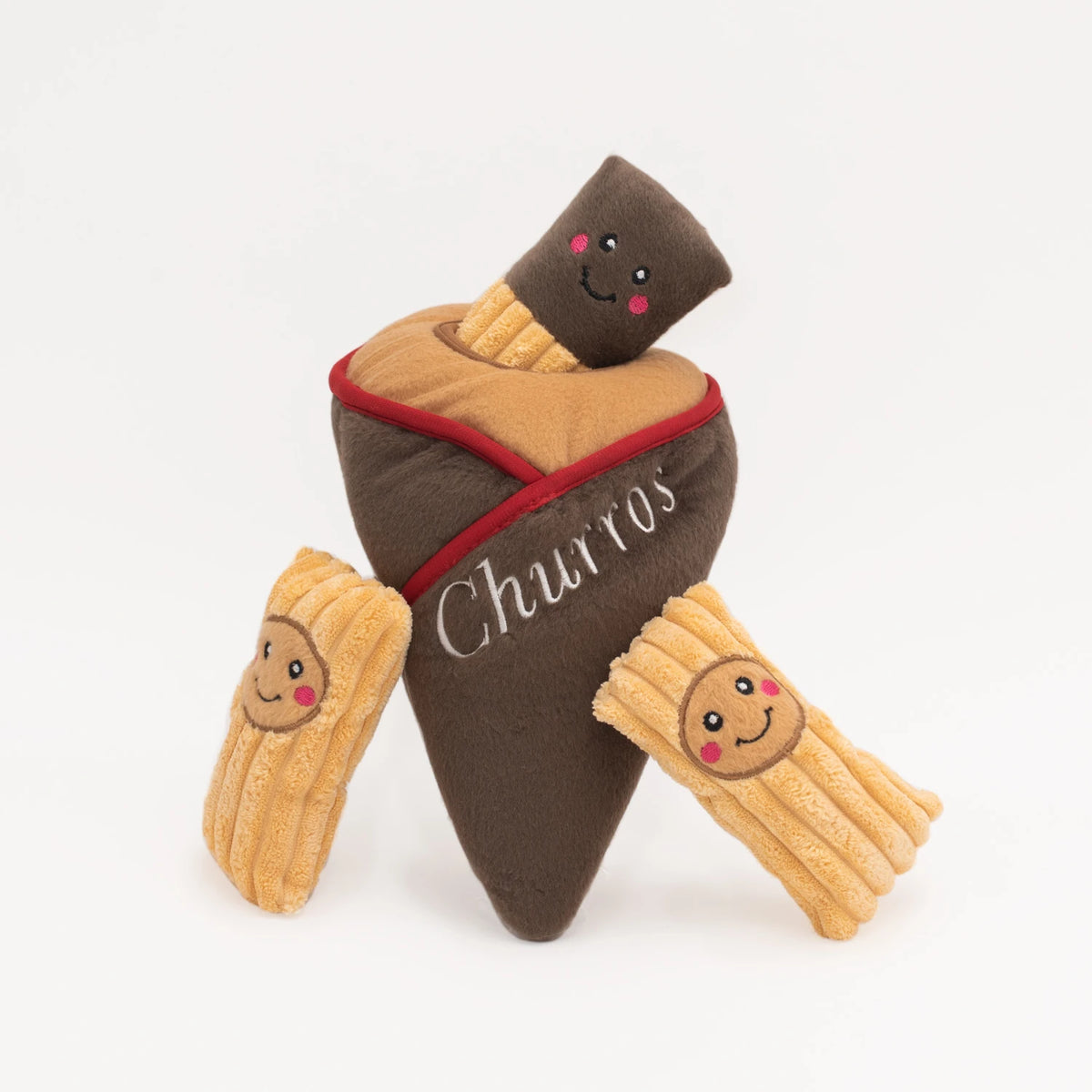 Zippy Paws Burrow churros dog toy with its squeaky churro sticks beside the sleeve