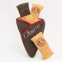 Zippy Paws Burrow plush dog toy: a churros sleeve holding three squeaky churro sticks