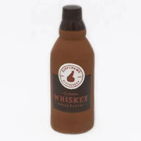Zippy Paws Happy Hour Crusherz latex dog toy shaped as a whiskey bottle, on white