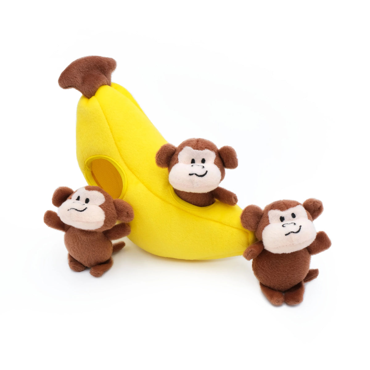 Zippy Paws Burrow plush dog toy: a yellow banana with three squeaky monkeys