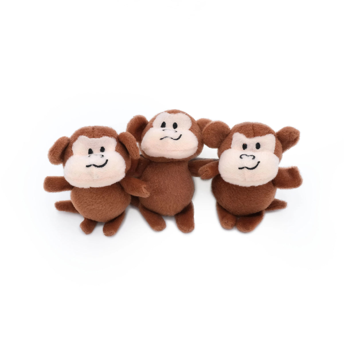 The three plush monkey squeakers from the Zippy Paws Burrow monkey and banana dog toy