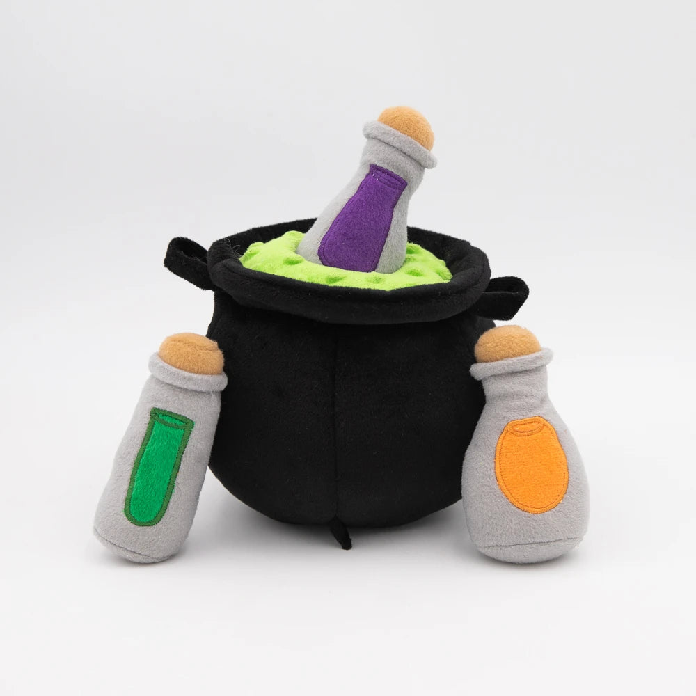 Zippy Paws Burrow plush dog toy: a witch's cauldron with squeaky potion bottles