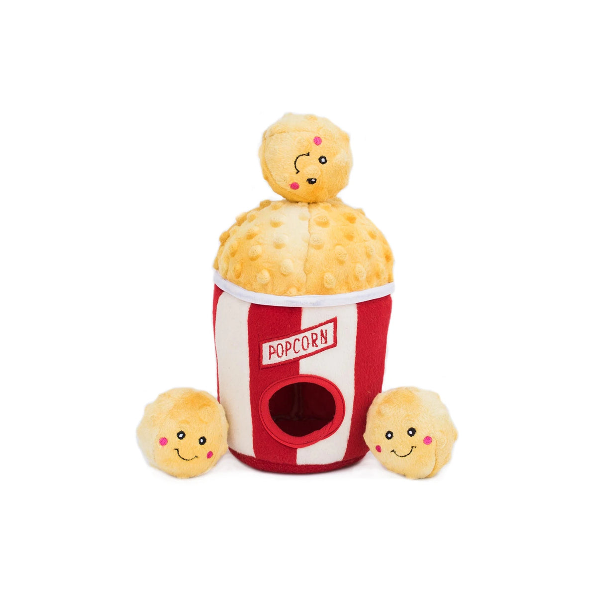 Zippy Paws Burrow popcorn bucket dog toy with its squeaky popcorn pieces beside it