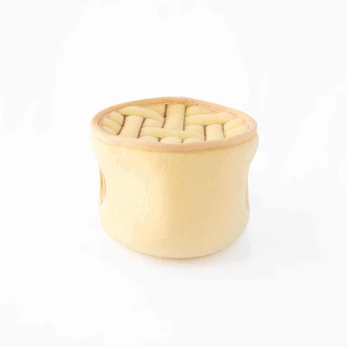 The plush steamer basket from the Zippy Paws Burrow soup dumplings dog toy