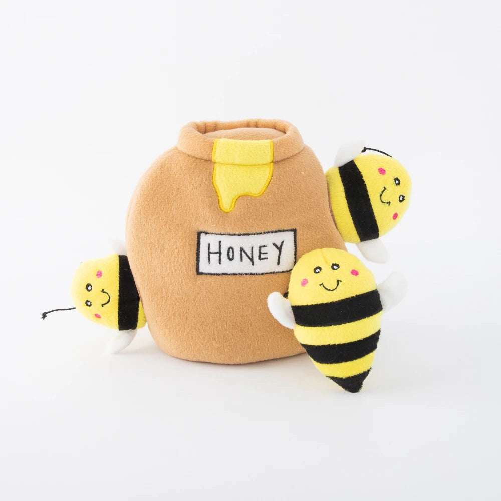 Zippy Paws Burrow plush dog toy: a honey pot with three squeaky bees