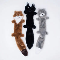 Three Zippy Paws Skinny Peltz stuffing-free plush dog toys: weasel, skunk and wolf