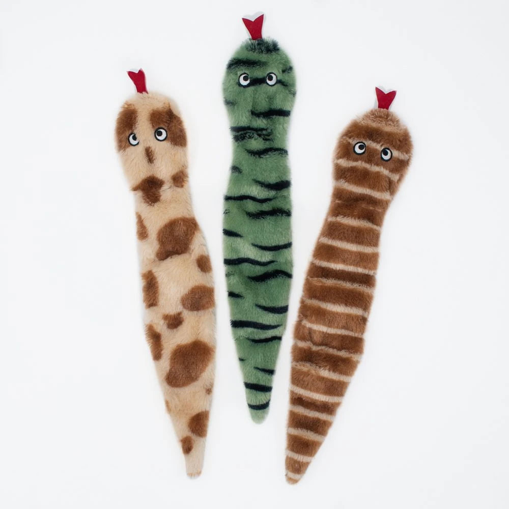 Three Zippy Paws Skinny Peltz stuffing-free plush snake dog toys in desert colours