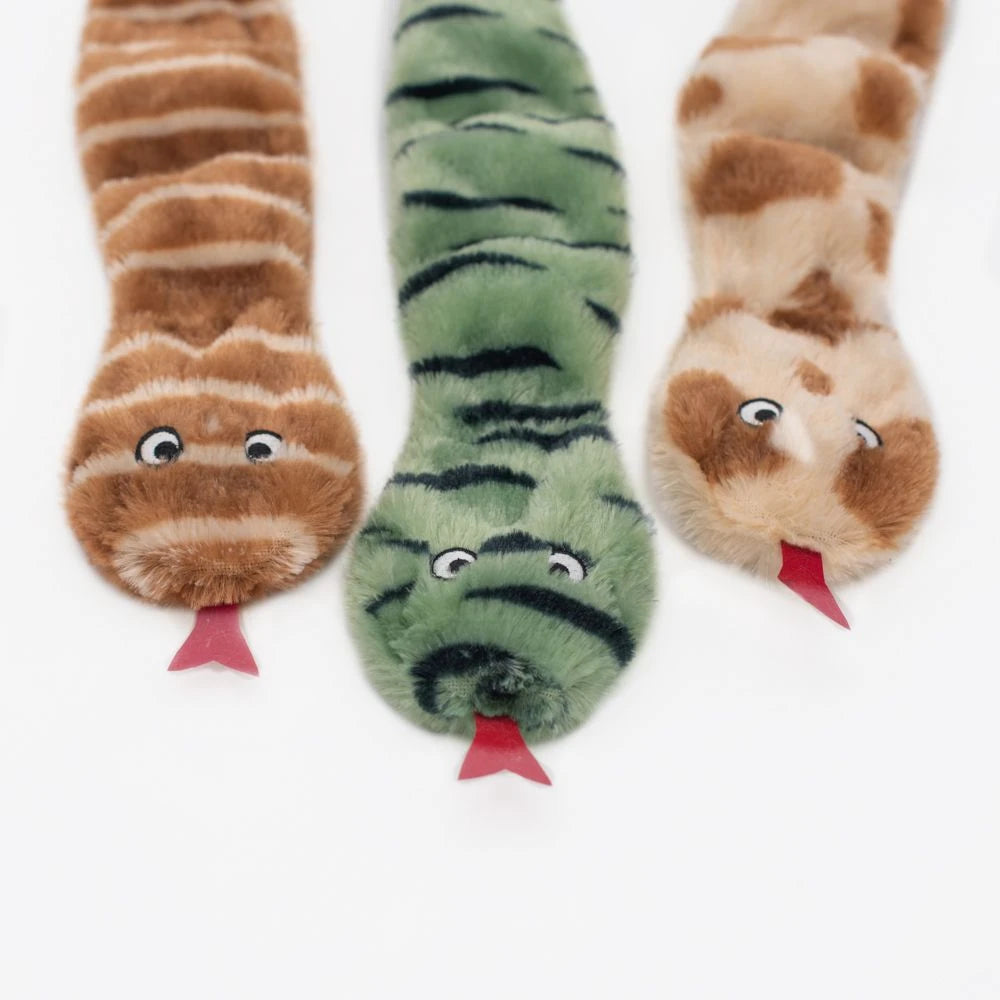 Close-up of the heads of three Zippy Paws Skinny Peltz plush snake dog toys