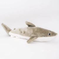 Zippy Paws Jigglerz plush grey shark dog toy shown side-on against a white background