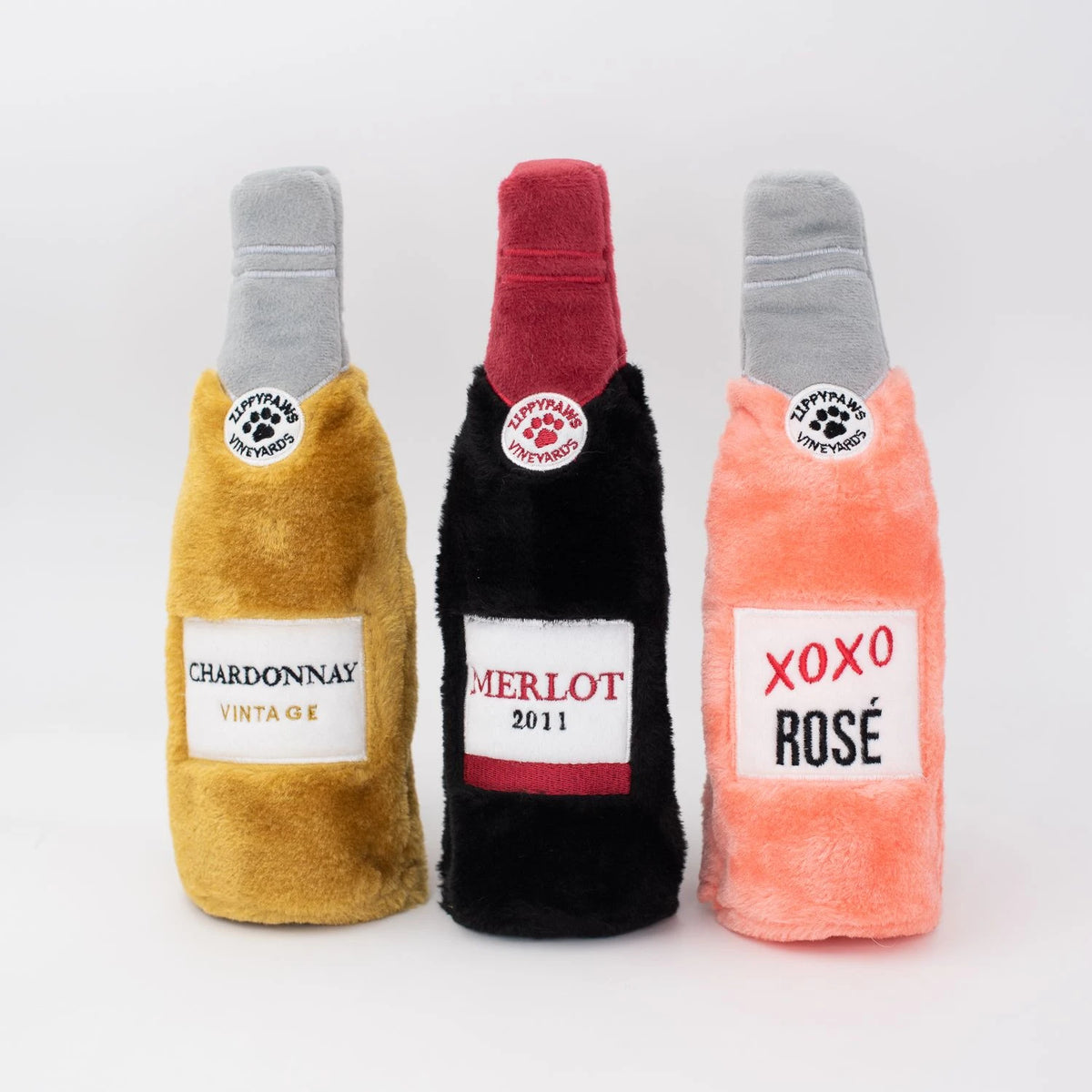 Three Zippy Paws Happy Hour Crusherz plush bottle dog toys: Chardonnay, Merlot and Rose