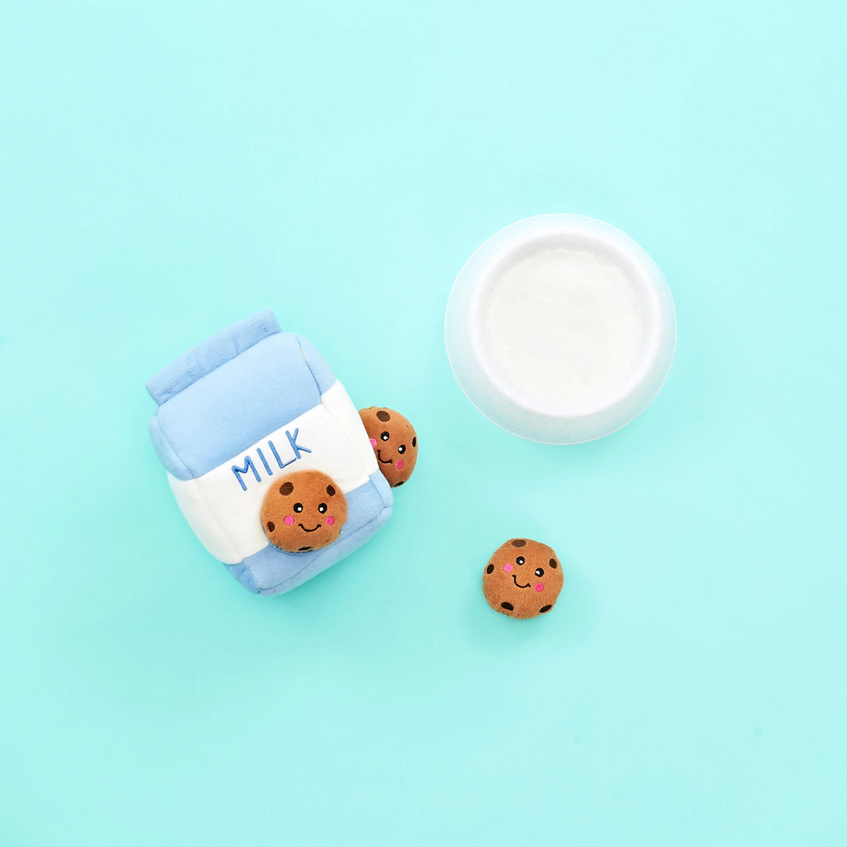 Zippy Paws Miniz plush cookie dog toys styled with a plush milk carton and a glass of milk