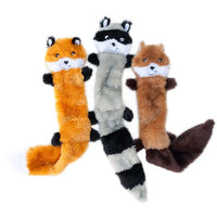 Three Zippy Paws Skinny Peltz stuffing-free plush dog toys: fox, raccoon and squirrel